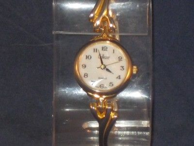 LADIES ELEGANT COLLEZIO QUARTZ GOLDTONE WATCH DAINTY WITH VERY UNIQUE 